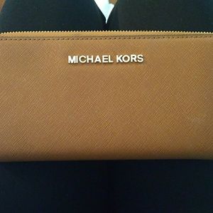 Leather MK tri fold wallet